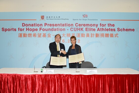 Ms. Marie-Christine Lee and Professor Henry Wong signed the agreement to kick-off the 'Sports for Hope Foundation—CUHK Elite Athletes Scheme'. 